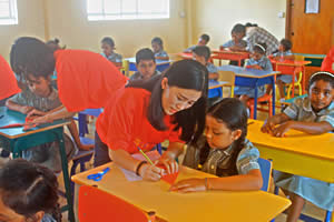 Hampton School pupils learning authentic Chinese paper cutting techniques